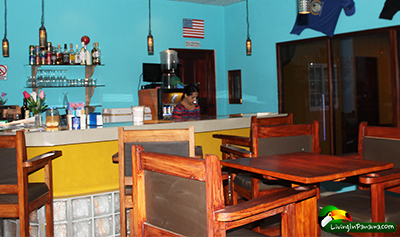 chairs and bar at a restaurant part of the hotel