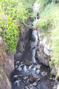 Picture from above of a canyon with river on bottom