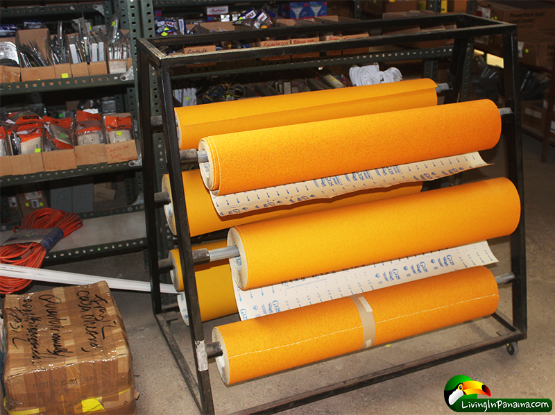Rolls of sandpaper and other hardware supplies