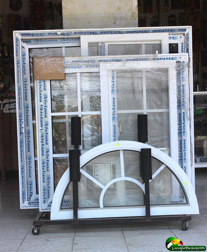 Windows, in white plastic frames, in a rack