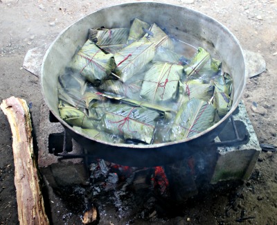 panama tamales cooking over wood fire