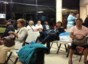 people sitting in chairs at David bus station in Panama