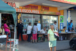 mix of people in front of a store in Panama